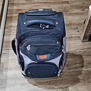 Fender rolling suitcase and detachable backpack.